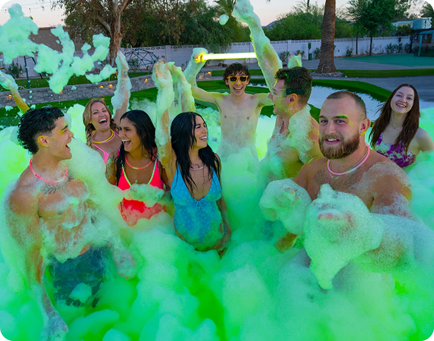 Group enjoying a colorful foam party